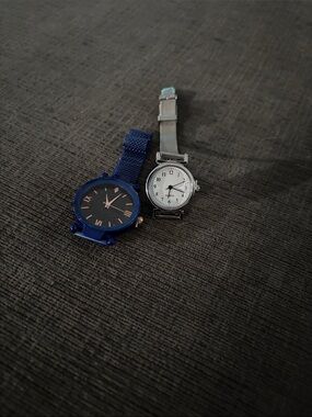 Navy Mesh Band Watch with black dial and Silver band watch with white dial.